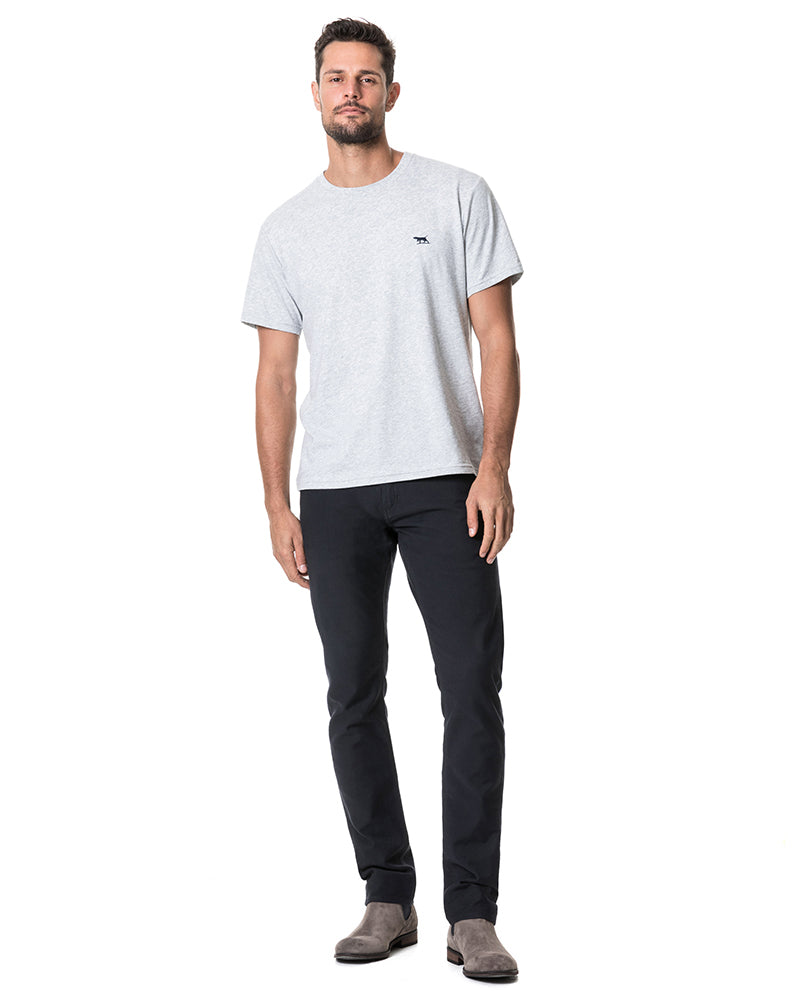 Model wearing Rodd & Gunn Motion 2 Straight Jean RL Navy.