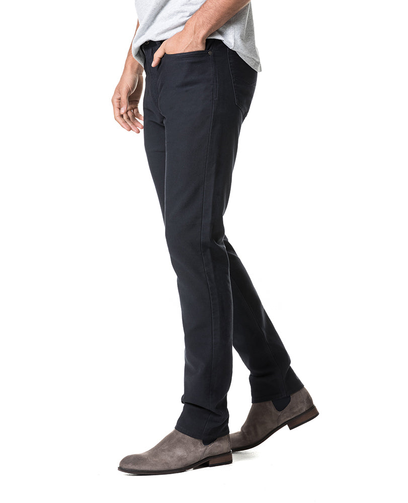 Model wearing Rodd & Gunn Motion 2 Straight Jean RL Navy.