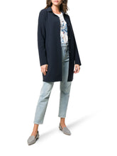 Load image into Gallery viewer, Model wearing Herno Women&#39;s Act First Scuba Snap Front Jacket in Blu Navy.
