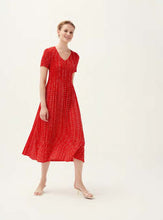 Load image into Gallery viewer, Model wearing Leo &amp; Ugo - Leaf Print Pleat Dress in Red/White.
