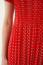 Load image into Gallery viewer, Model wearing Leo &amp; Ugo - Leaf Print Pleat Dress in Red/White.
