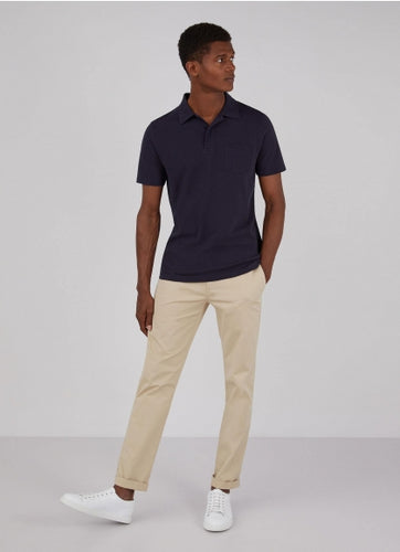 Model wearing Sunspel Riviera Polo Shirt Navy.