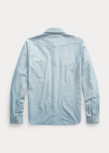 Load image into Gallery viewer, Back of RRL slim fit chambray western shirt in Davey Wash.
