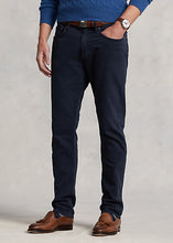 Load image into Gallery viewer, Model wearing POLO Ralph Lauren - Sullivan Slim Knitlike Chino Pant in Avaitor Navy.
