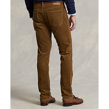 Load image into Gallery viewer, Model wearing Polo Ralph Lauren - Varick Slim Straight Stretch Corduroy 5-Pocket Pant in Sepia - back.
