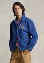 Load image into Gallery viewer, Model wearing POLO Ralph Lauren - Ralph&#39;s Marina Poplin Jacket in Vineyard Royal.
